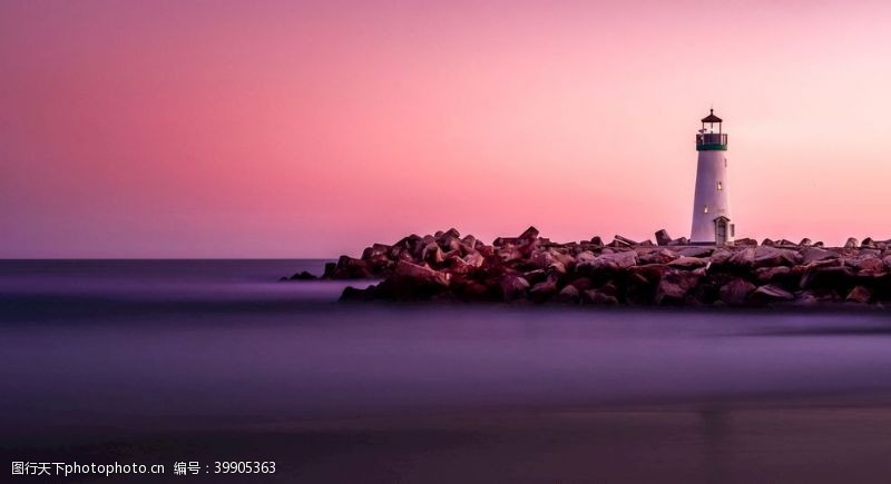 灯塔岩石海滨日落天空图片