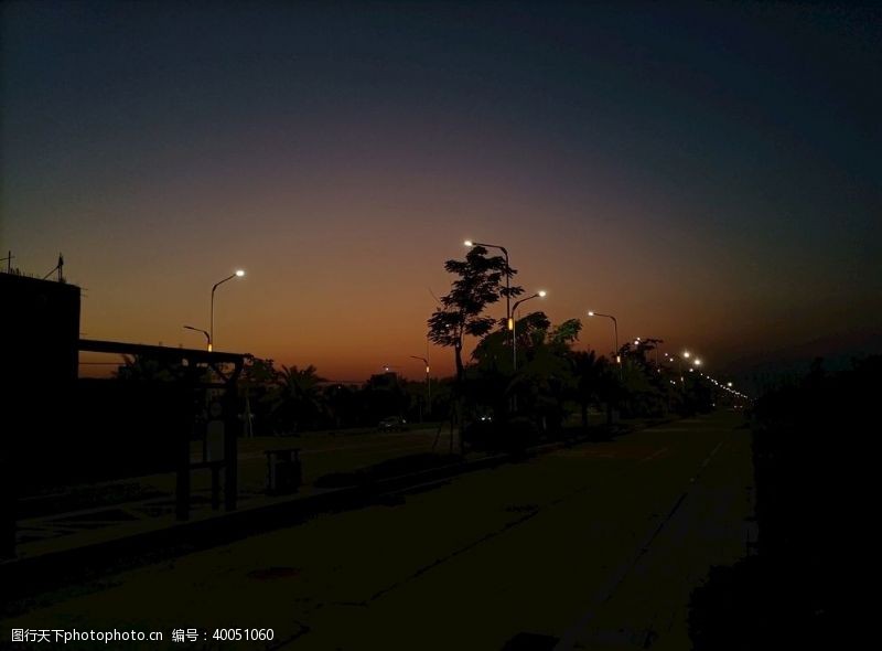 夕阳落日城市夜景图片