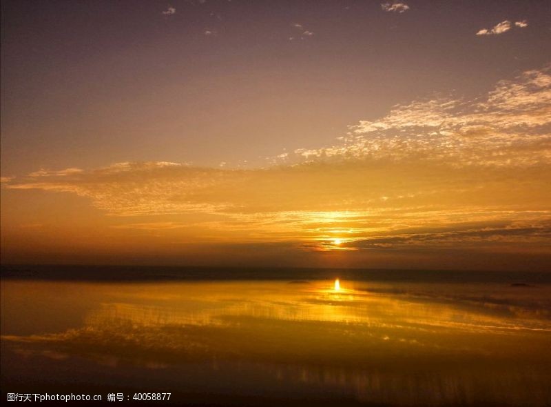 清晨阳光日出大海图片