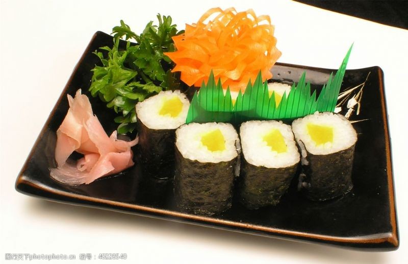 寿司高清摄影黄咸菜寿司卷图片